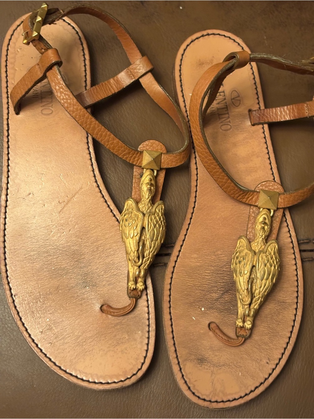 Valentino Garavani Brown Leather Sandals with Gold Gryphon.
